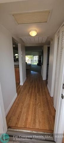 a kitchen with granite countertop a stove and a sink