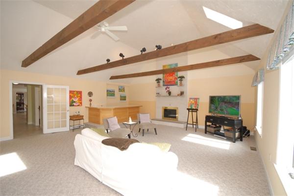55 Ballardvale Road Andover, MA 01810 - Photo 1 of 26 a living room with furniture large window and a table