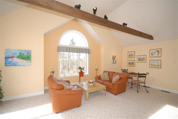 55 Ballardvale Road Andover, MA 01810 - Photo 13 of 26 a living room with furniture and a large window