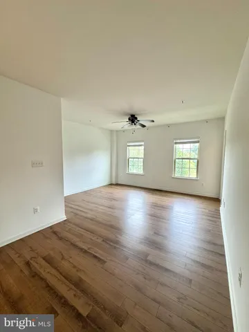 a utility room with cabinets washer and dryer