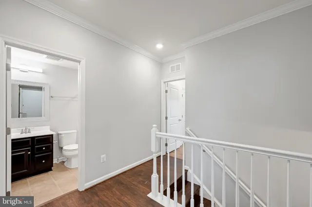 a view of entryway with wooden floor