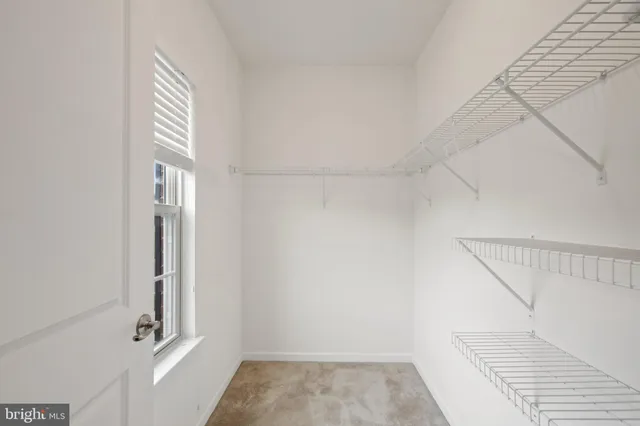 a view of a hallway with entryway