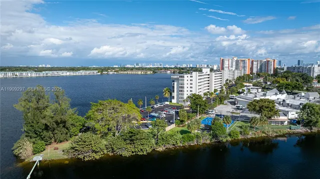 a view of a lake with a city