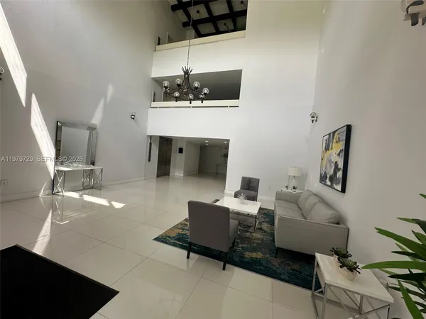 a kitchen with stainless steel appliances a sink and stove