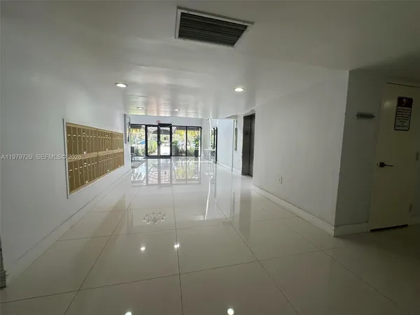 a view of storage and utility room with washer and dryer