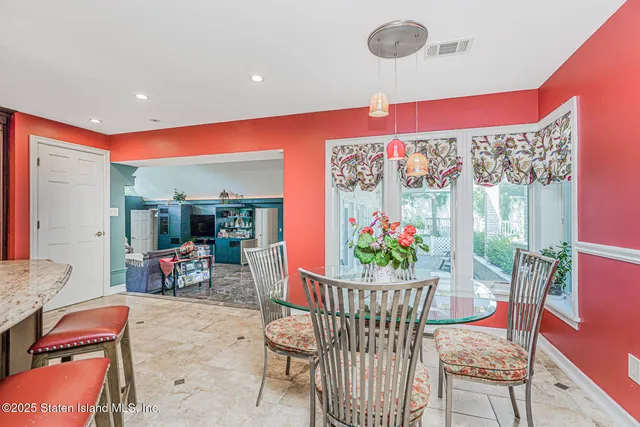 a view of a dining room with furniture