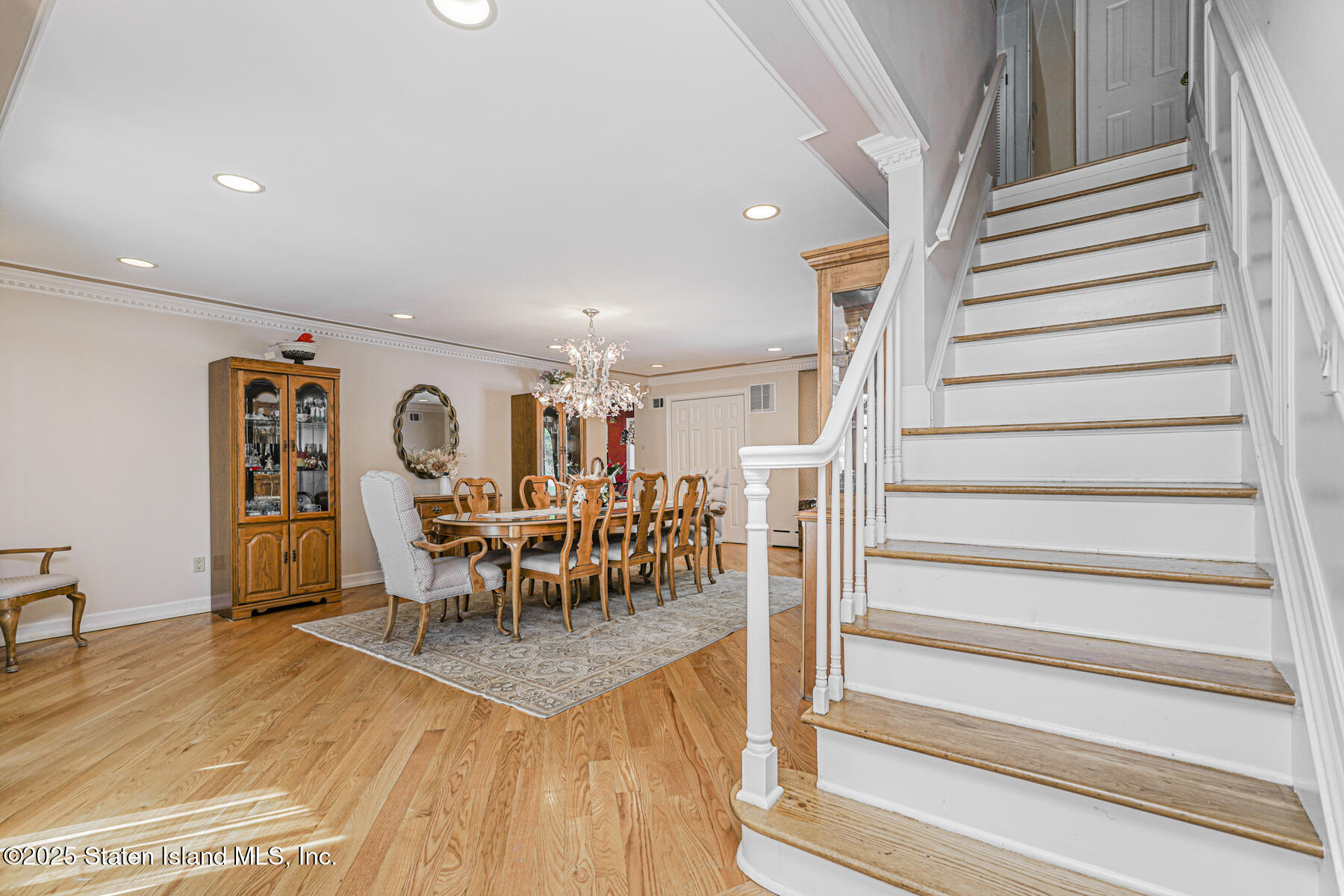 26 Highpoint Road Staten Island, NY 10304 - Photo 4 of 36 a view of a livingroom with furniture and a rug