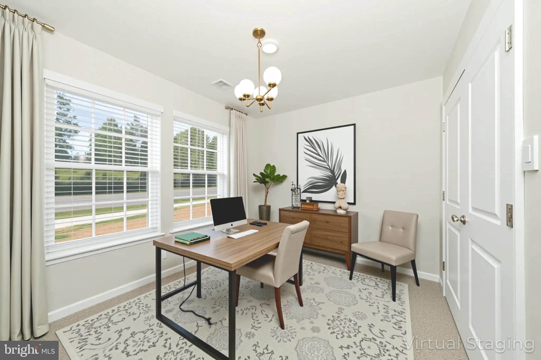 8634 Walter Martz Road Frederick, MD 21702 - Photo 2 of 52 a workspace with wooden floor and a window