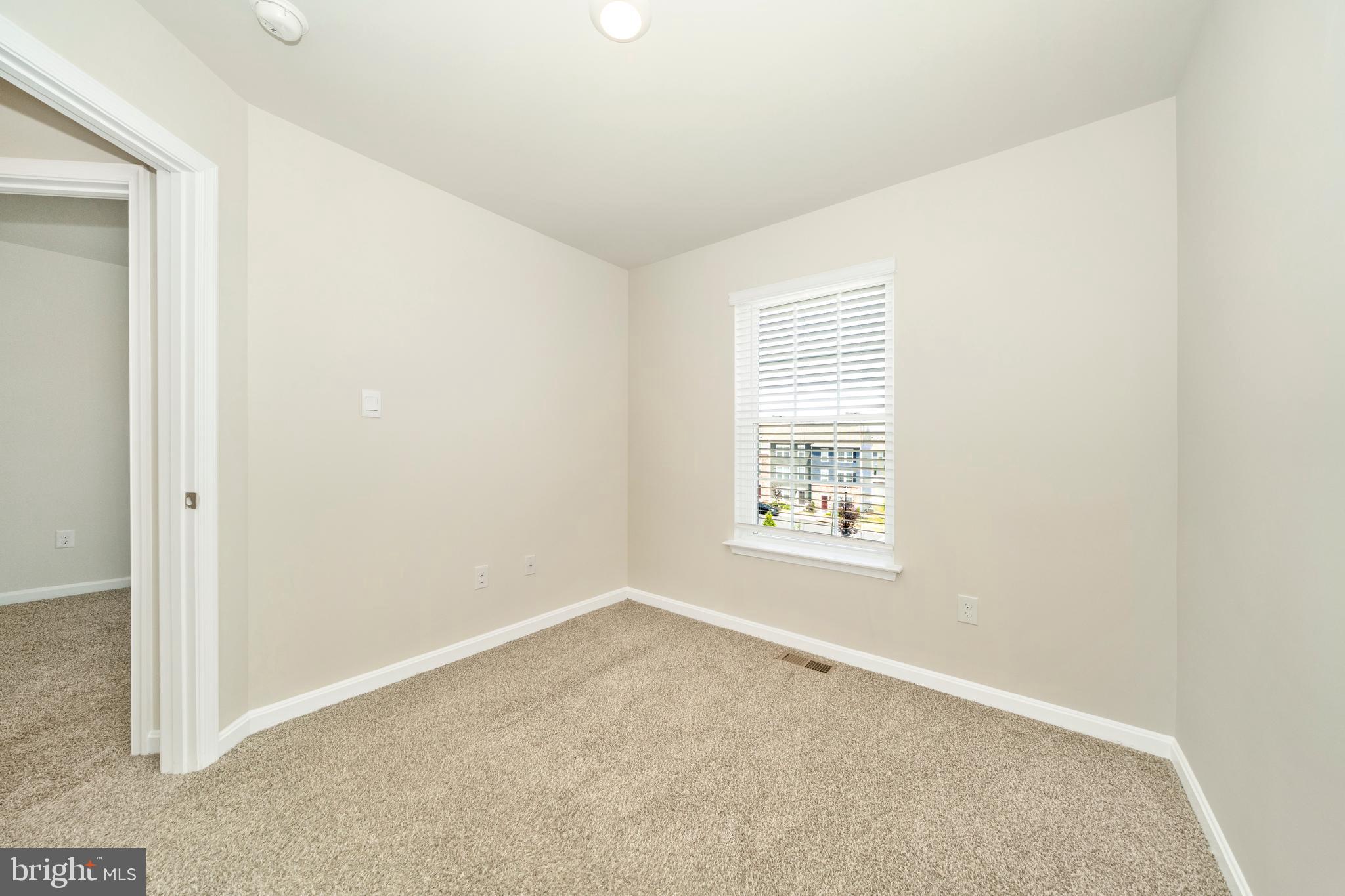 8634 Walter Martz Road Frederick, MD 21702 - Photo 37 of 52 an empty room with windows