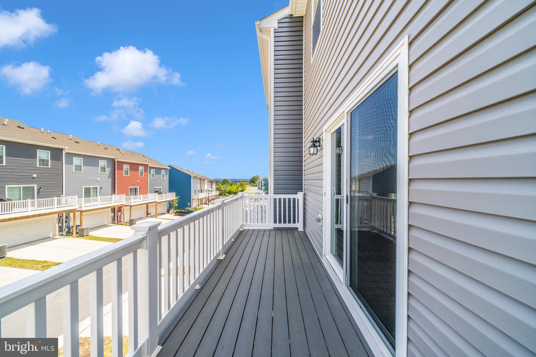 8634 Walter Martz Road Frederick, MD 21702 - Photo 44 of 52 a view of balcony with a potted plant