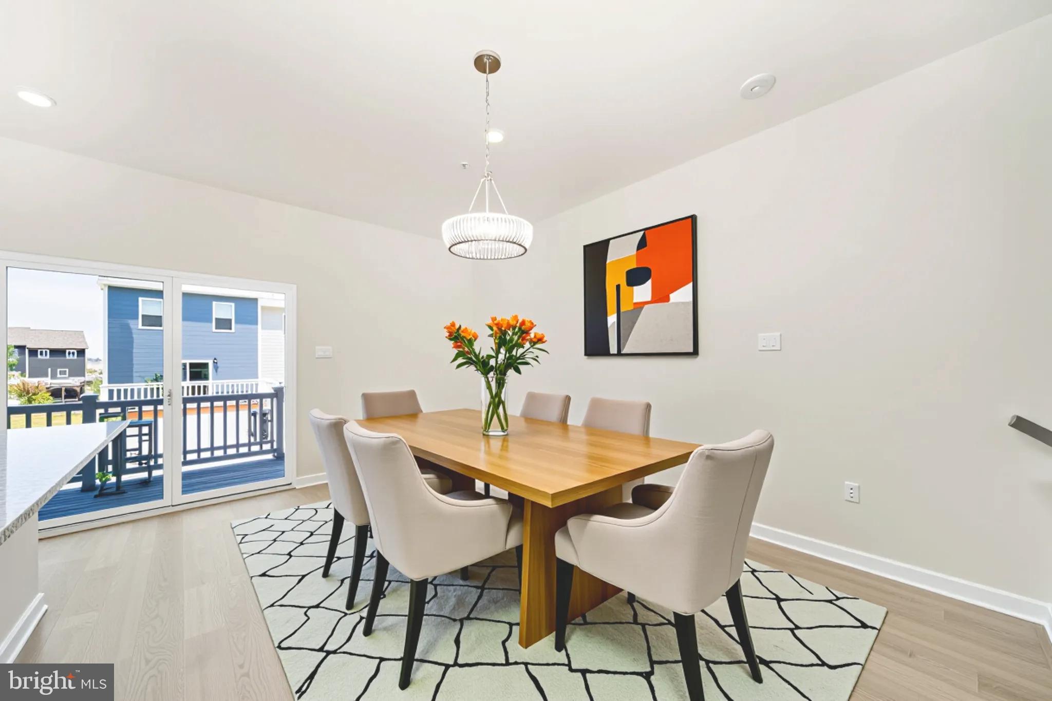 8634 Walter Martz Road Frederick, MD 21702 - Photo 5 of 52 a view of a dining room with furniture and wooden floor