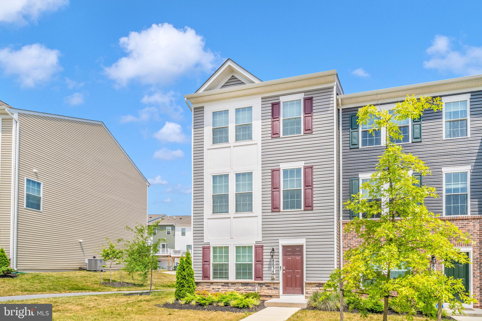 8634 Walter Martz Road Frederick, MD 21702 - Photo 51 of 52 a front view of a house with a garden and plants