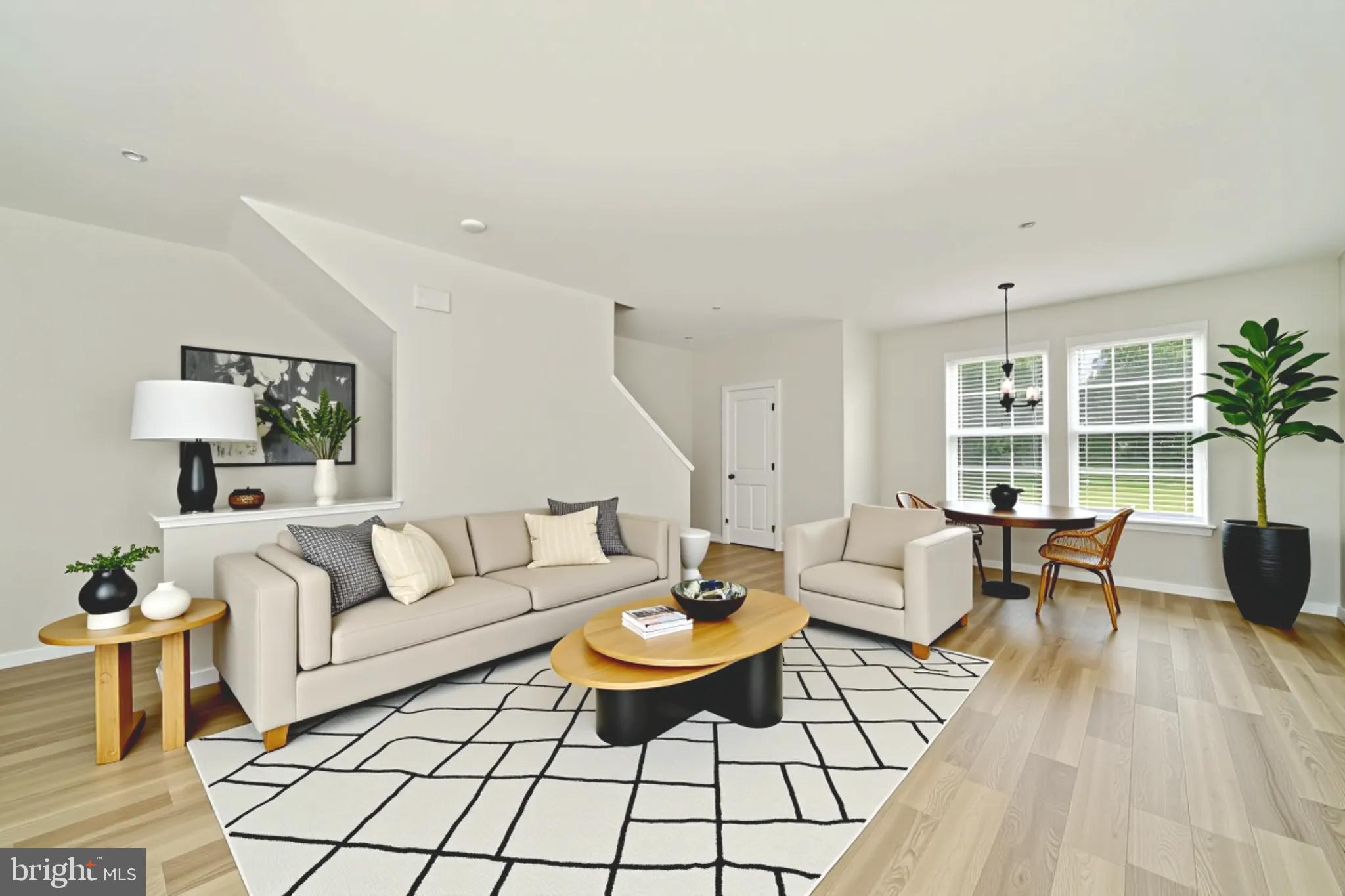 8634 Walter Martz Road Frederick, MD 21702 - Photo 6 of 52 a living room with furniture a table and a large window
