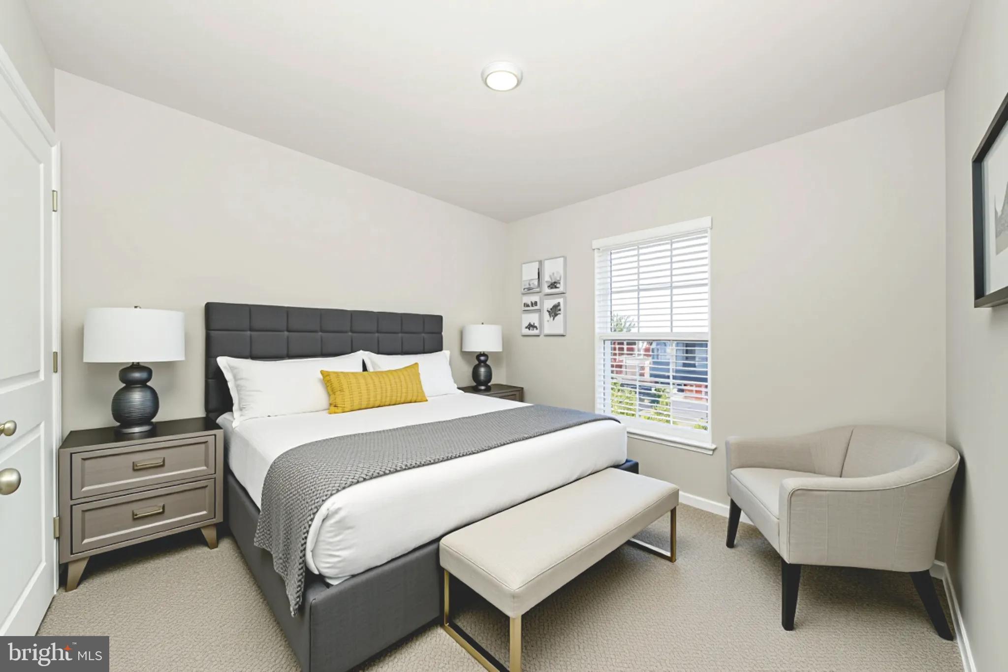 8634 Walter Martz Road Frederick, MD 21702 - Photo 8 of 52 a bedroom with a bed and a couch