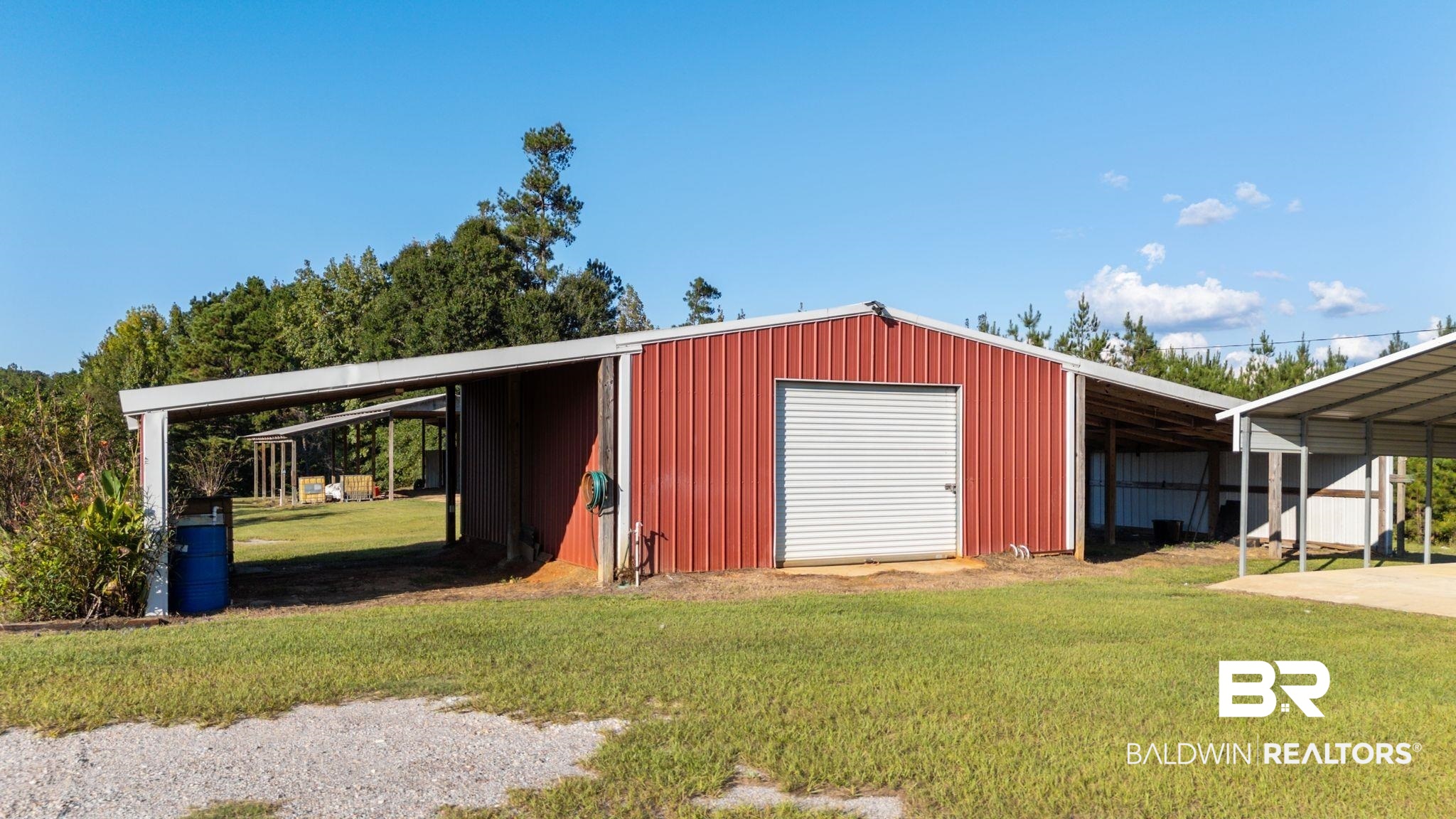 888 Mobile Cut-Off Road St. Stephens, AL 36569 - Photo 42 of 54 View of pole building with a yard