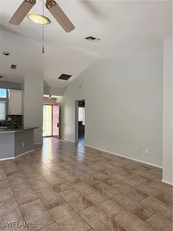 a view of an empty room and window