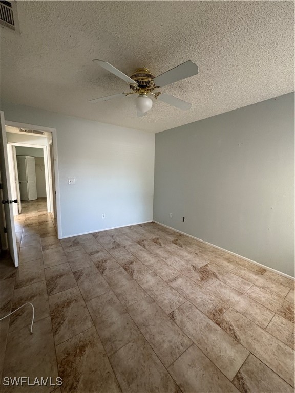 5560 Longleaf Drive North Fort Myers, FL 33917 - Photo 21 of 40 an empty room with a empty space and windows