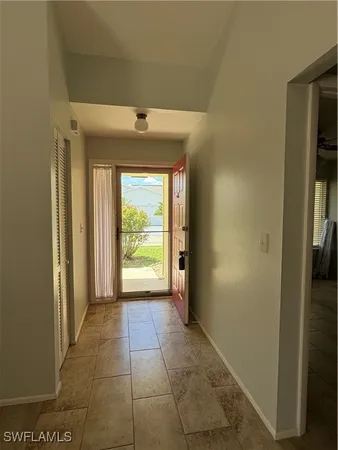 a view of an empty room and window