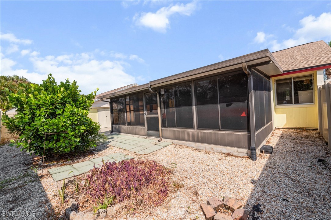 5560 Longleaf Drive North Fort Myers, FL 33917 - Photo 32 of 40 a view of a house with a yard