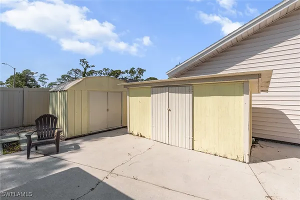 a view of backyard with cabin
