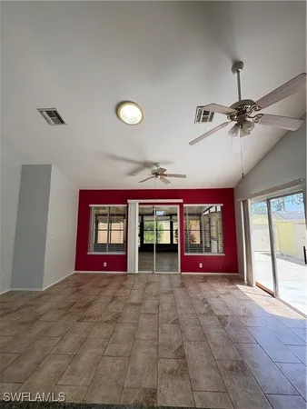a view of swimming pool with red walls