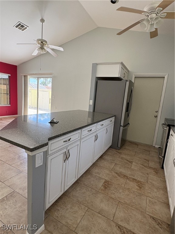 5560 Longleaf Drive North Fort Myers, FL 33917 - Photo 9 of 40 a kitchen with granite countertop white cabinets and white appliances