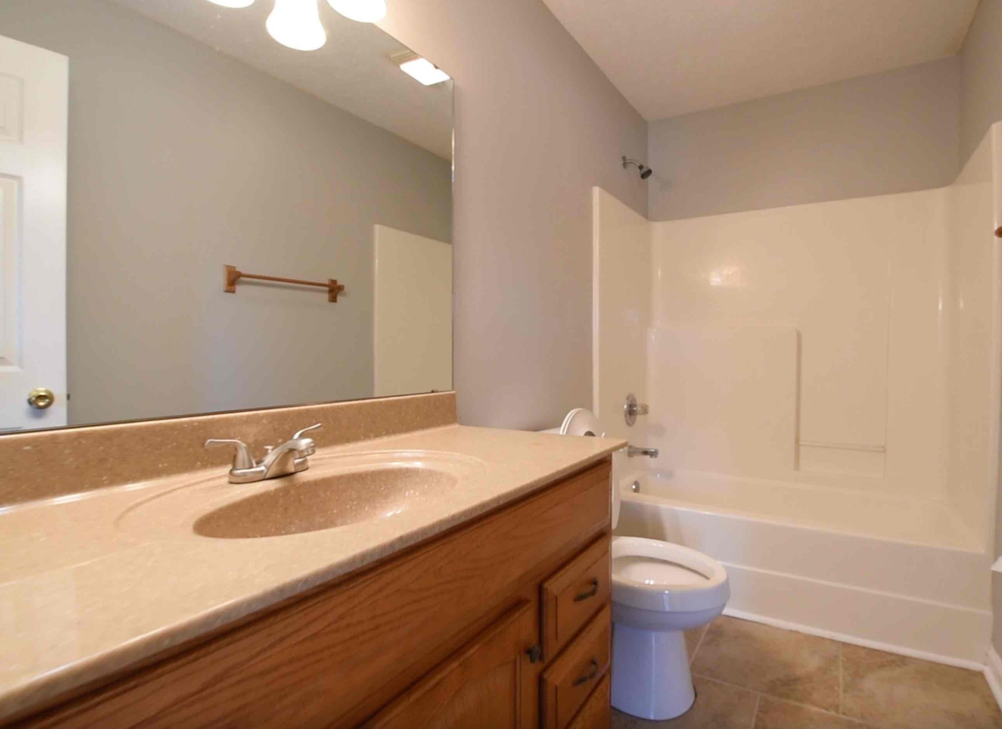 105 Phillip Drive Springfield, TN 37172 - Photo 19 of 24 a bathroom with a granite countertop sink toilet and shower