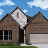 a front view of a house with garage