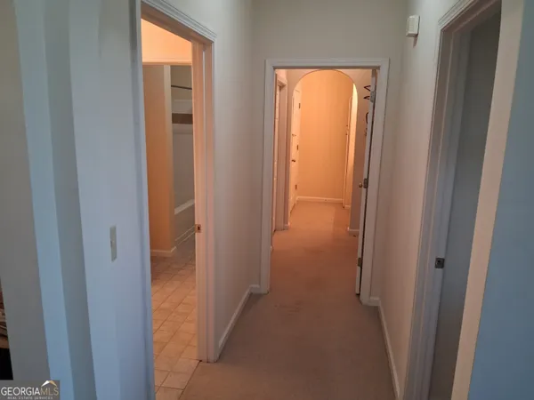 a view of a bathroom with a glass door
