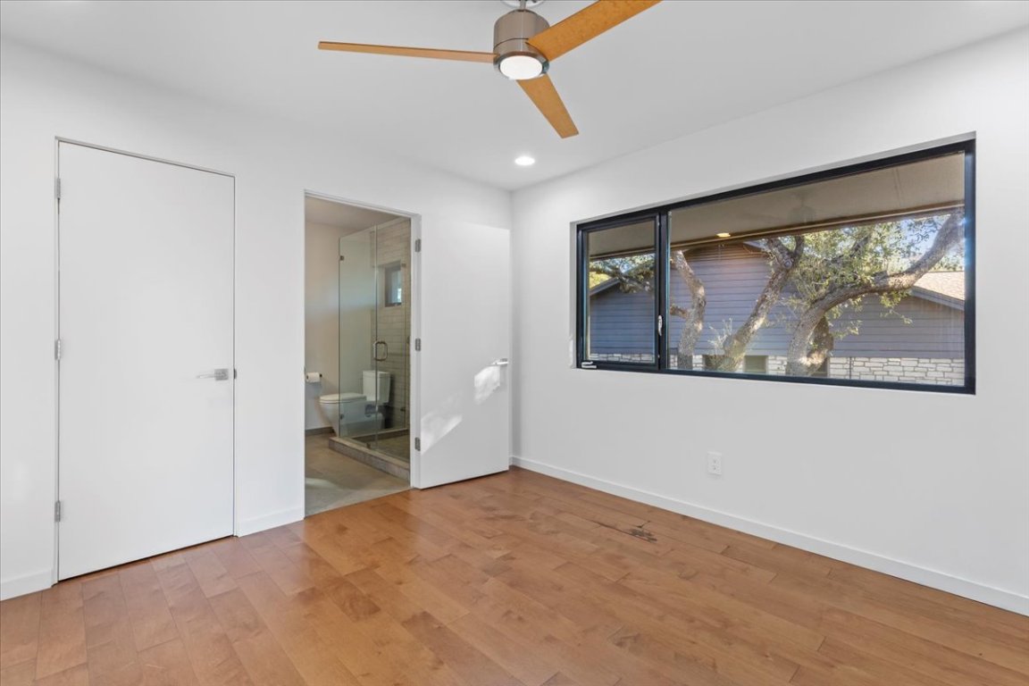 3923 Glengarry Drive Austin, TX 78731 - Photo 21 of 33 a view of an empty room with a window