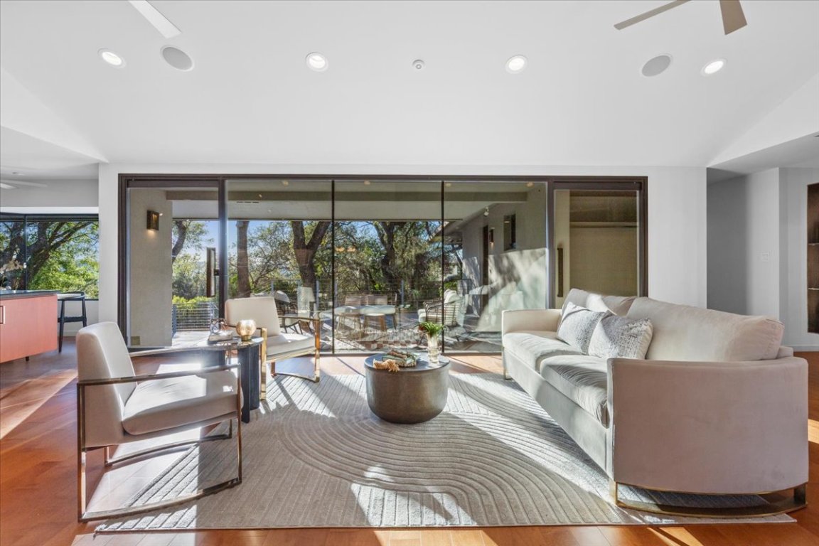 3923 Glengarry Drive Austin, TX 78731 - Photo 6 of 33 a living room with furniture and large windows
