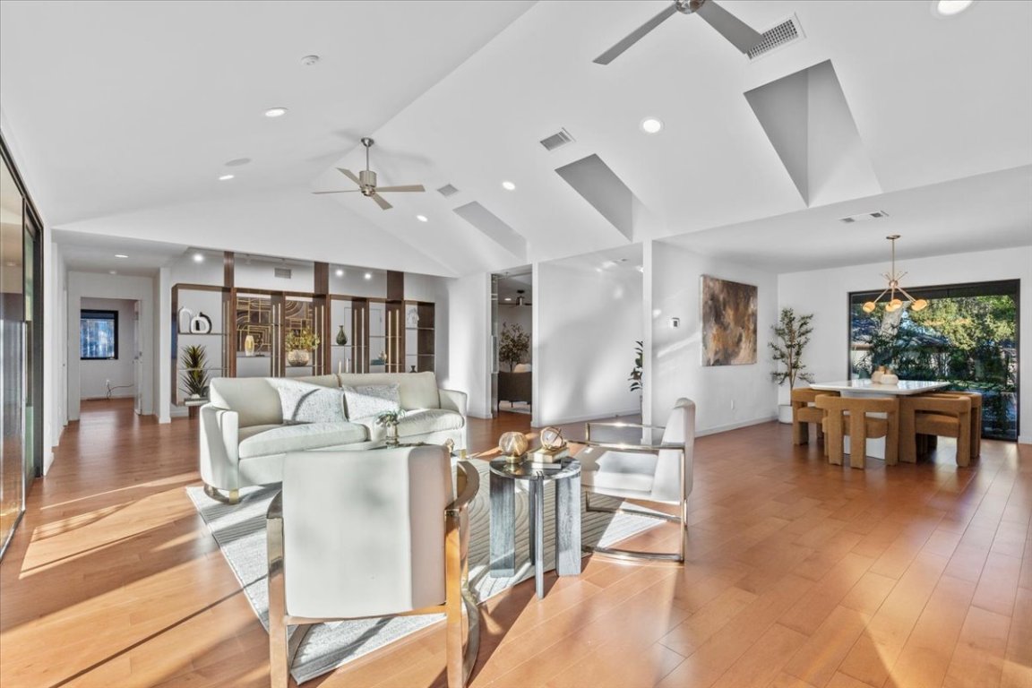 3923 Glengarry Drive Austin, TX 78731 - Photo 7 of 33 a view of a dining room with furniture window and wooden floor