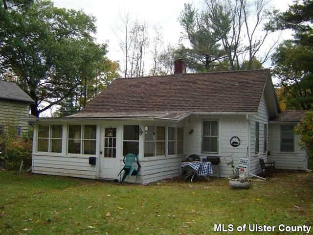21 Cricket Ridge Woodstock, NY 12409 - Photo 1 of 1 a view of a house with a yard and sitting area