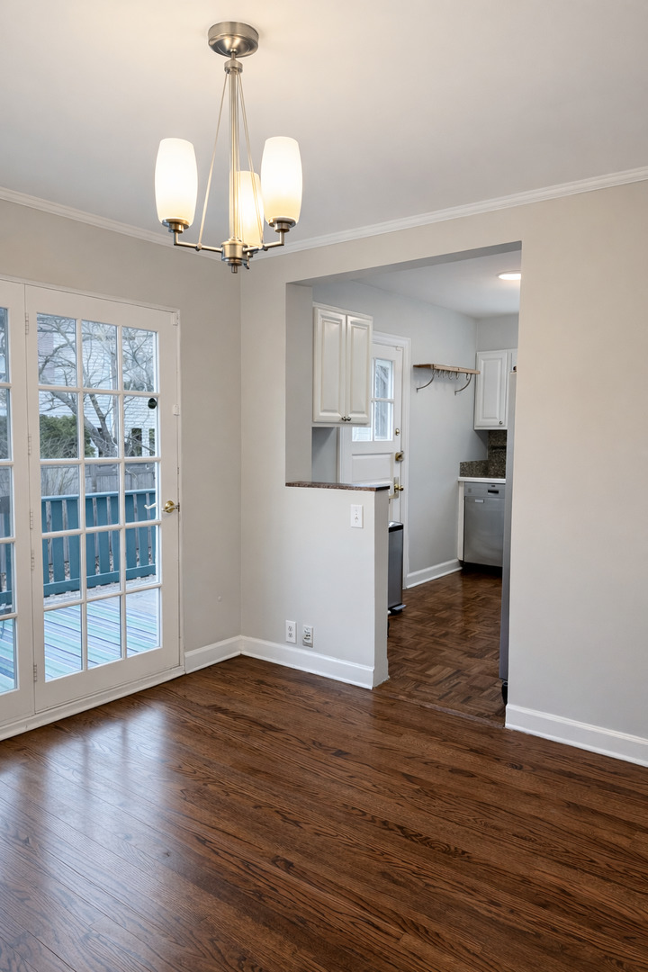 2727 Elgin Road Evanston, IL 60201 - Photo 6 of 11 a view of a kitchen with wooden floor and windows