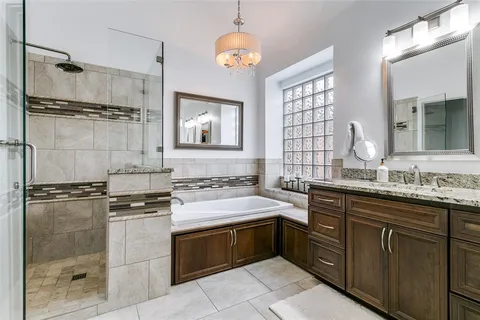 a kitchen with a stove a sink and a refrigerator