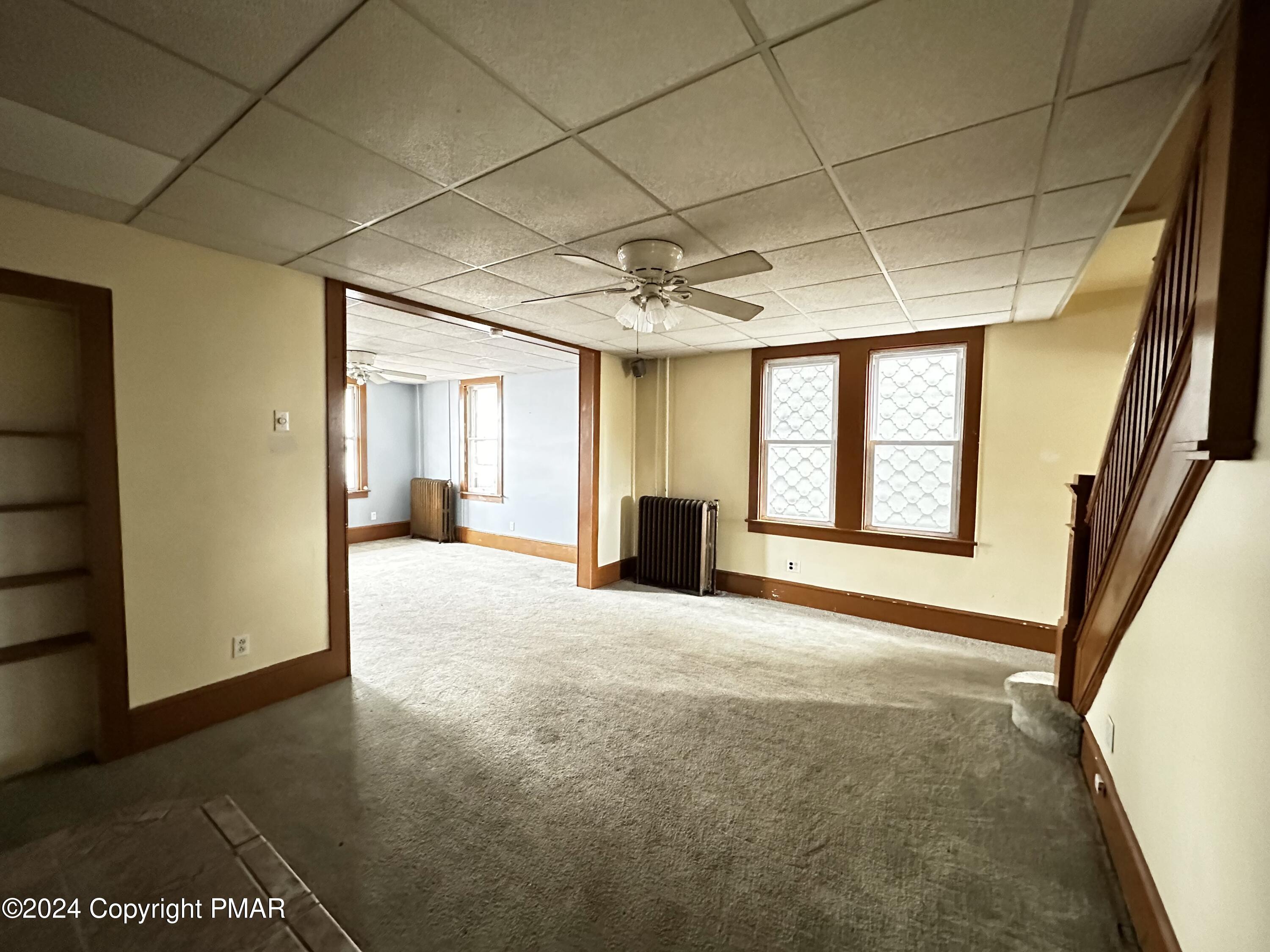 308 South Beech Street Mount Carmel, PA 17851 - Photo 13 of 34 a view of empty room with a fireplace