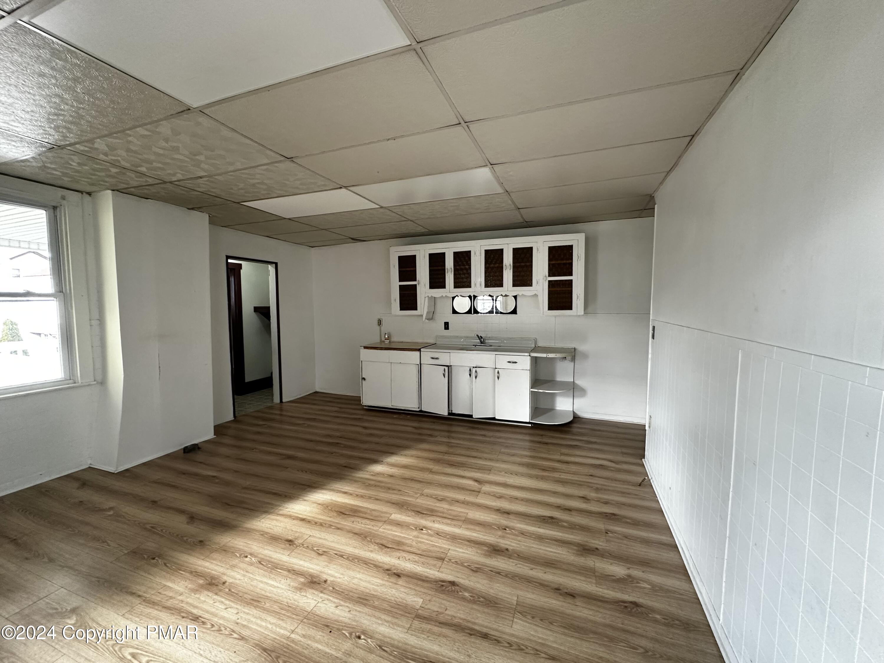 308 South Beech Street Mount Carmel, PA 17851 - Photo 16 of 34 a spacious bedroom with a bed and a window