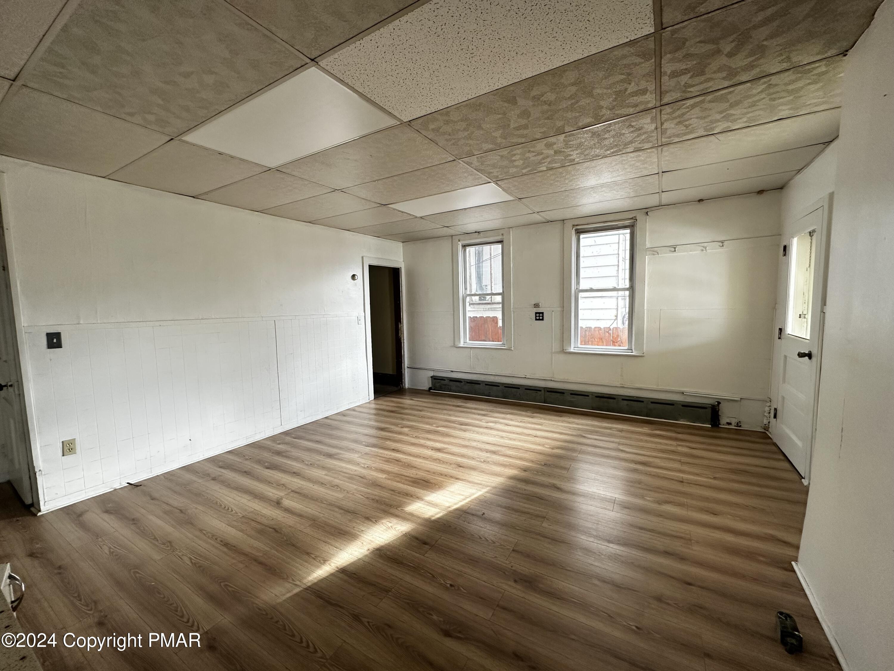 308 South Beech Street Mount Carmel, PA 17851 - Photo 17 of 34 a view of empty room with wooden floor and fan