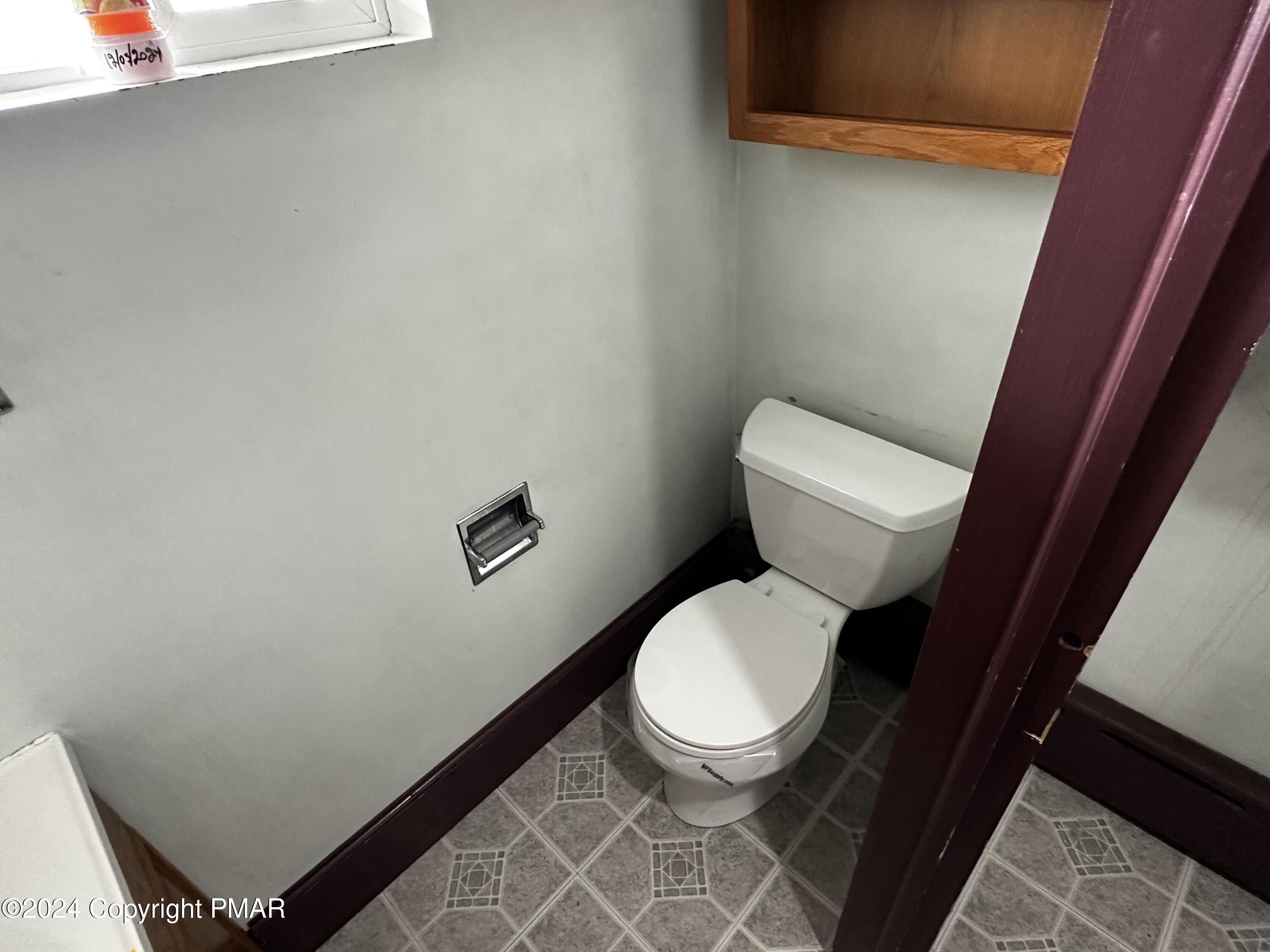 308 South Beech Street Mount Carmel, PA 17851 - Photo 20 of 34 a white toilet sitting next to a small sink
