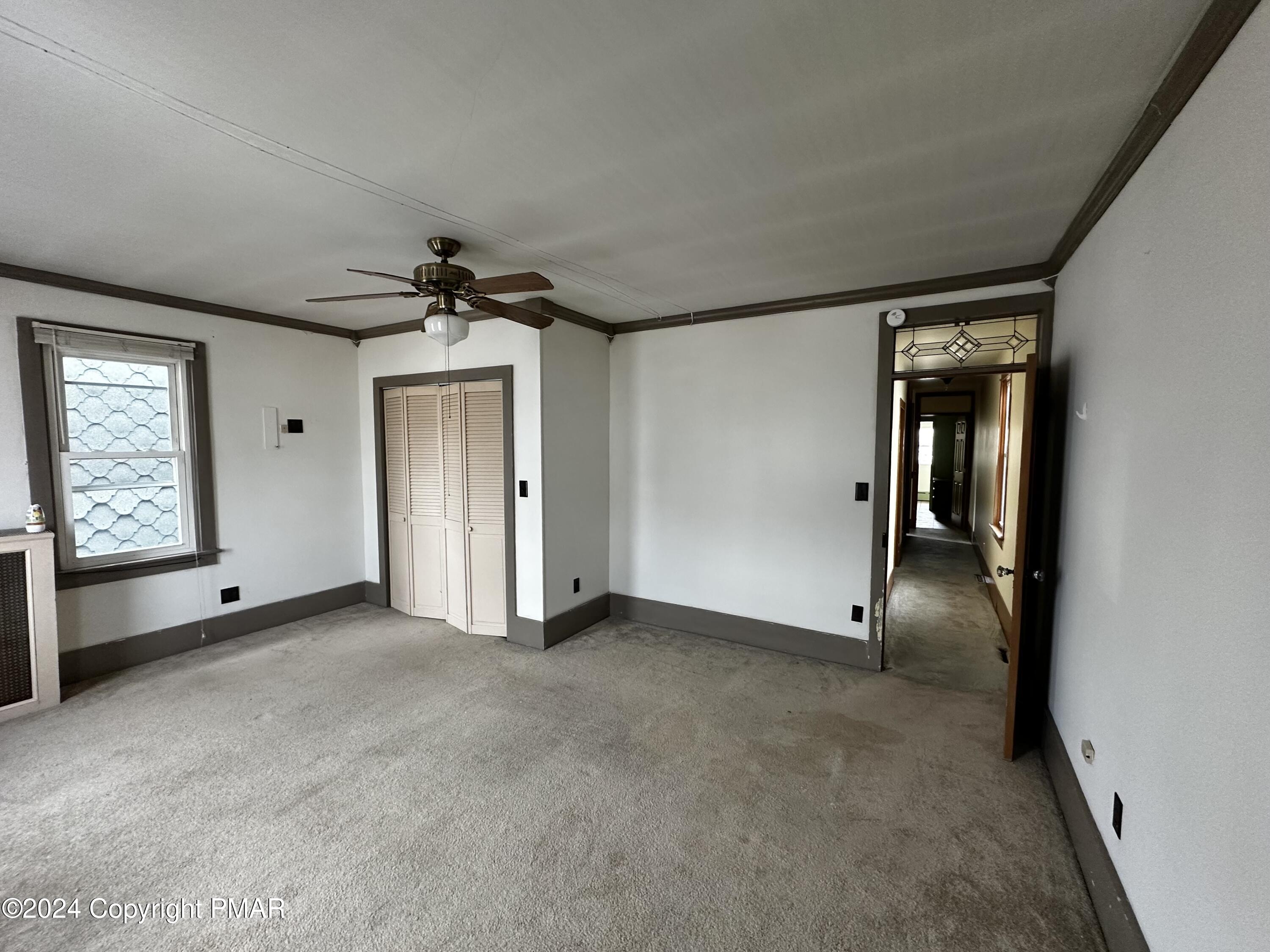 308 South Beech Street Mount Carmel, PA 17851 - Photo 21 of 34 an empty room with windows and closet