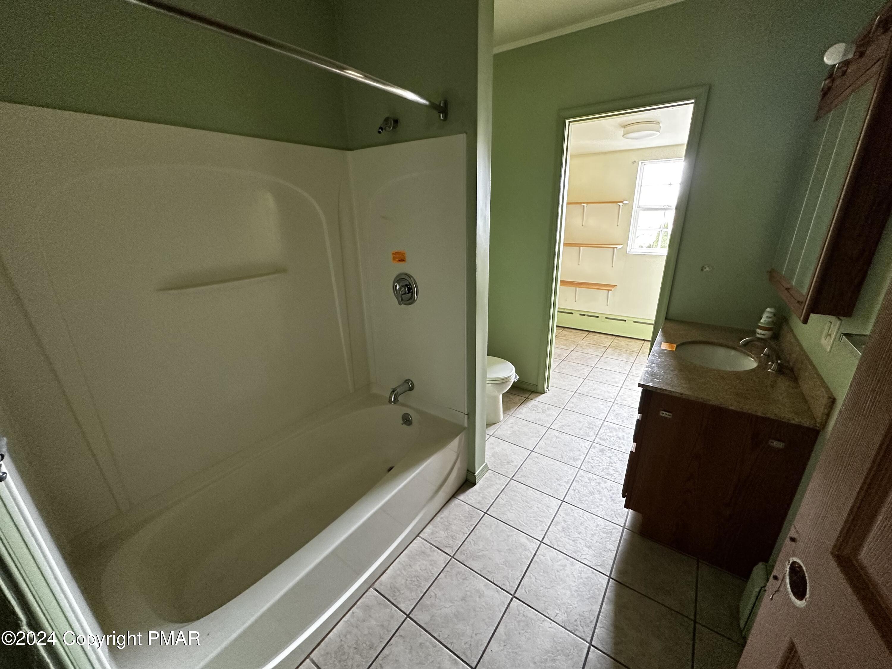 308 South Beech Street Mount Carmel, PA 17851 - Photo 28 of 34 a bathroom with a bathtub and shower