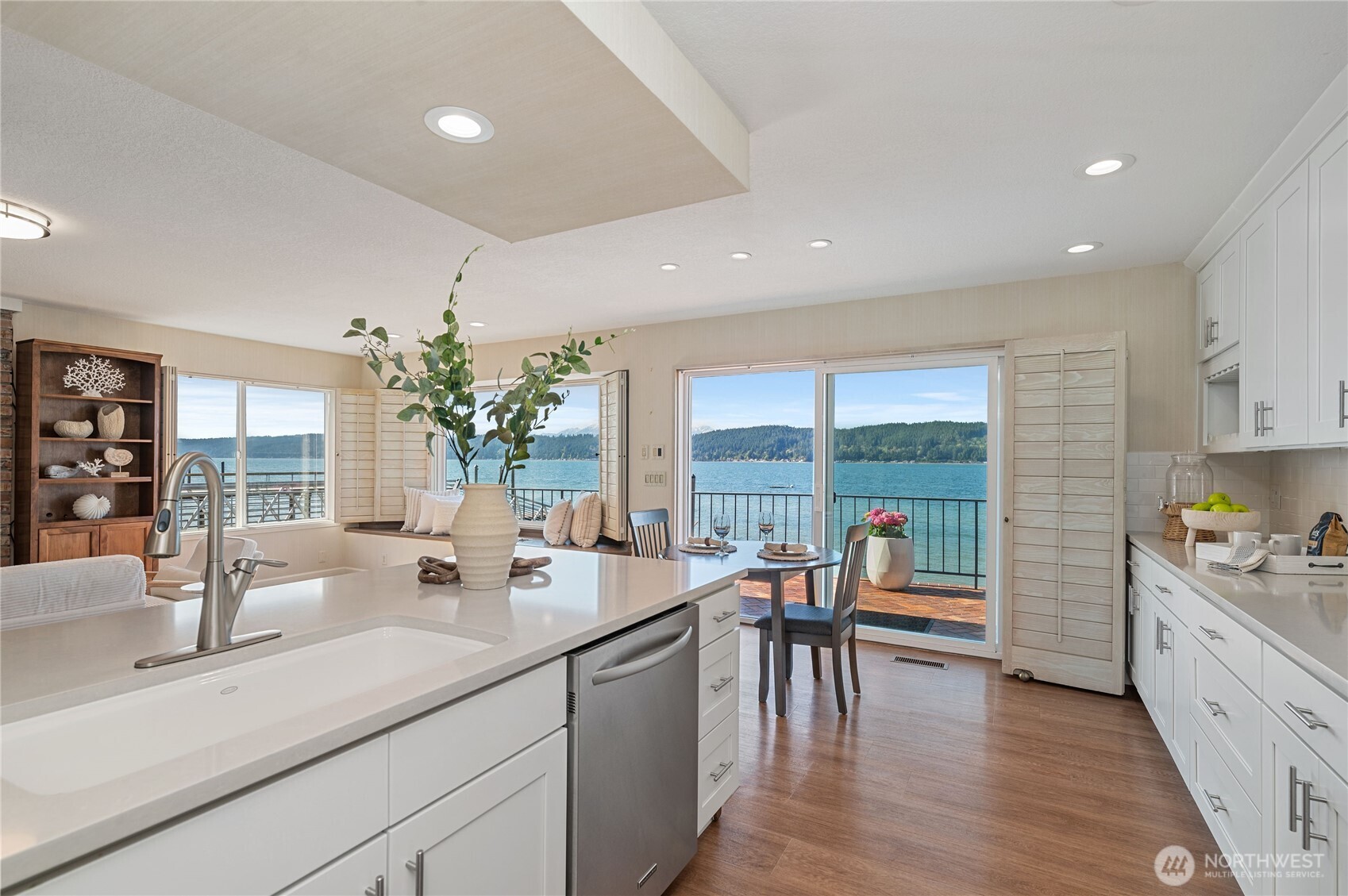 14191 Highway 106 Belfair, WA 98528 - Photo 17 of 40 a kitchen with sink and view of living room