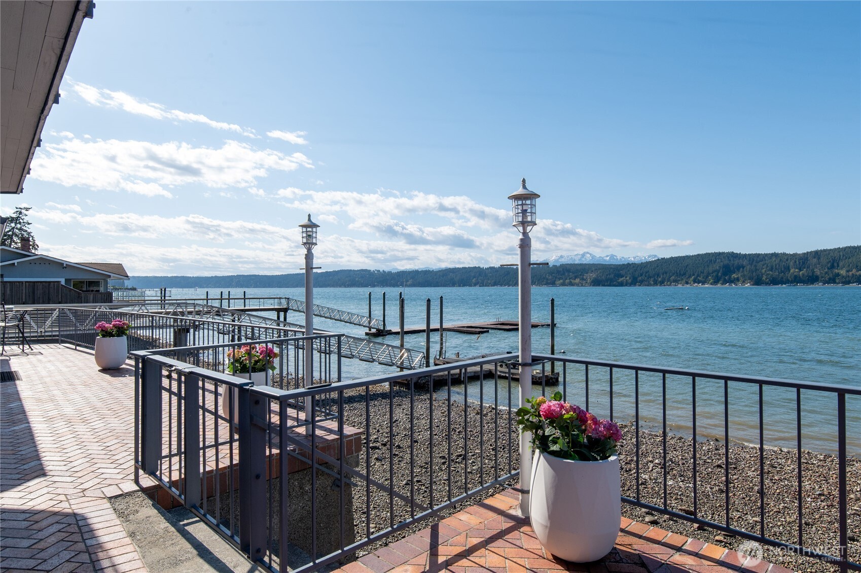 14191 Highway 106 Belfair, WA 98528 - Photo 33 of 40 a view of a balcony with wooden chairs