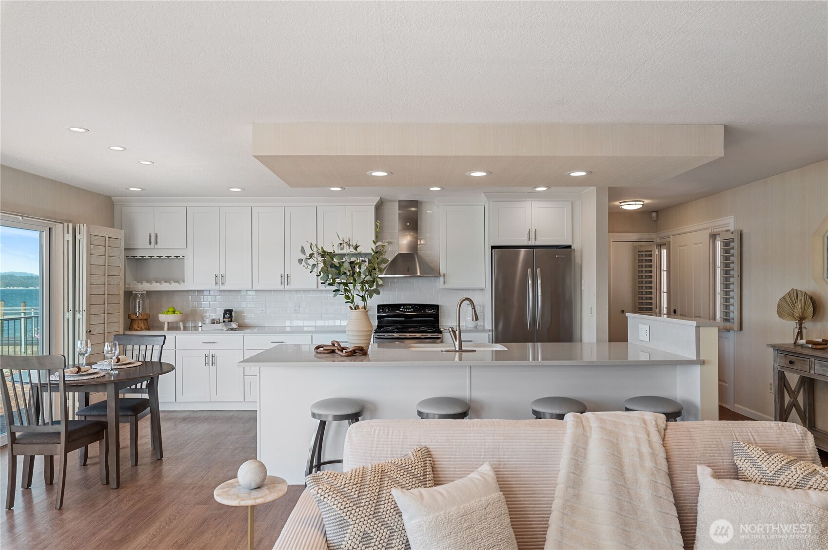 14191 Highway 106 Belfair, WA 98528 - Photo 6 of 40 a large kitchen with a table and chairs