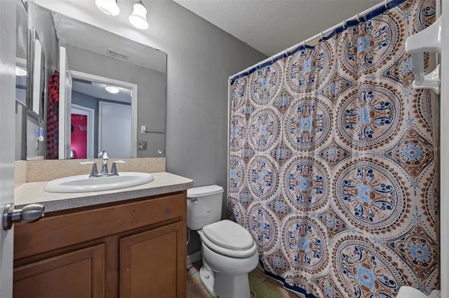 a bathroom with a sink and a toilet