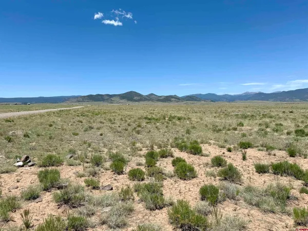 a view of an outdoor space and mountain view