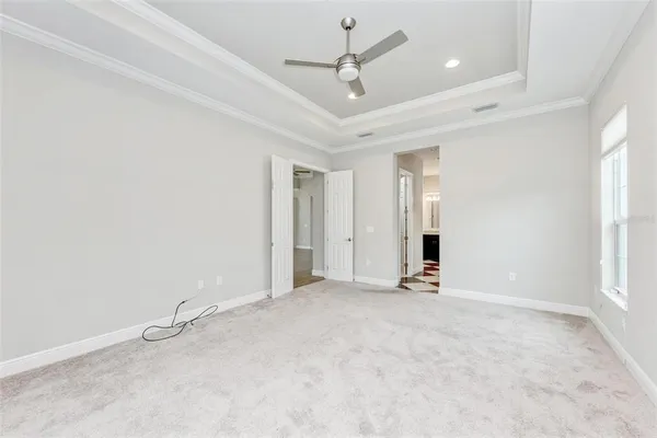 a bathroom with a double vanity sink and a toilet