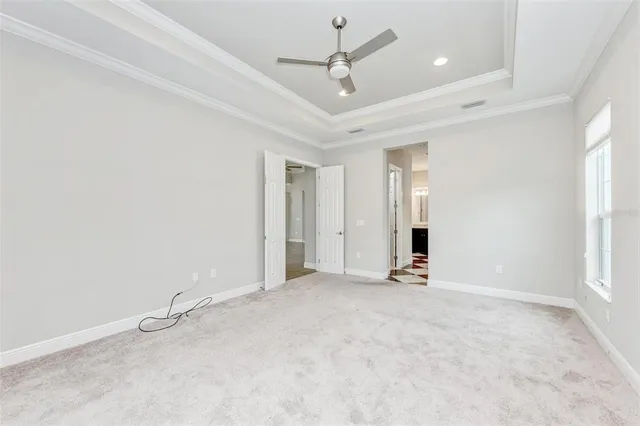 a bathroom with a double vanity sink and a toilet