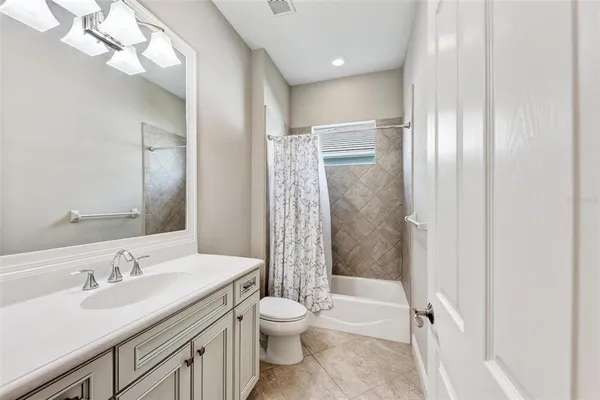 a view of a room with a large window