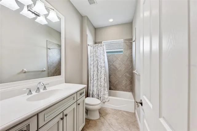 a view of a room with a large window